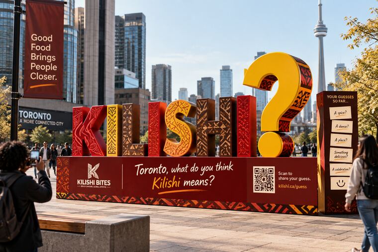 Public square installation of giant KILISH? letters with a yellow question mark, captioned “Toronto, what do you think Kilishi means?”