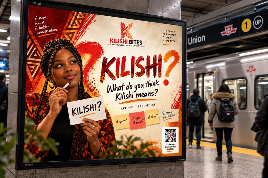 Backlit platform poster at Union Station showing the “What do you think Kilishi means?” teaser with commuters walking past.